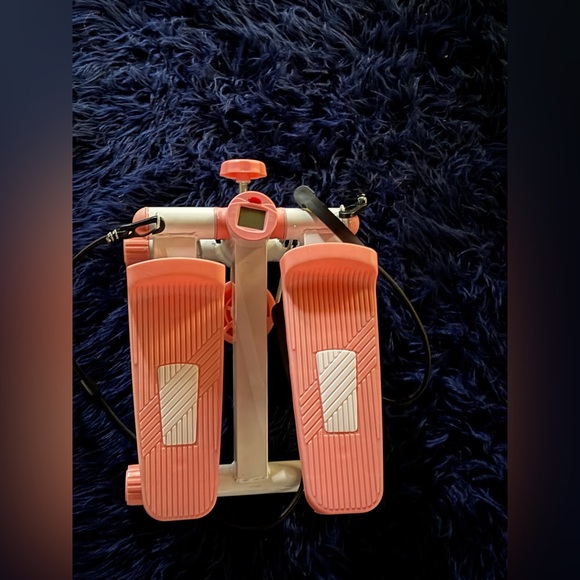 Pink and White Stepper Exercise Machine